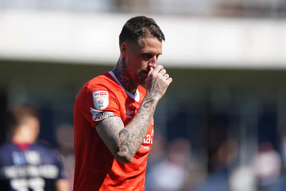 Sonny Bradley is set to return for Luton at home to Blackpool (Tim Goode/PA)