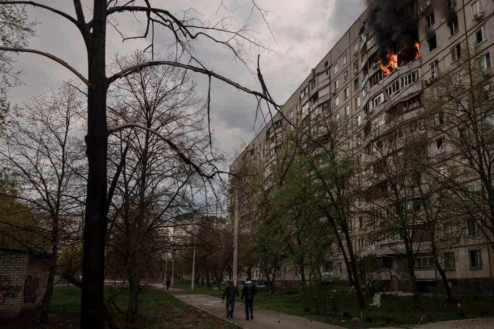 An apartment on fire after it was hit during a Russian bombardment in Kharkiv, Ukraine (Felipe Dana/AP)