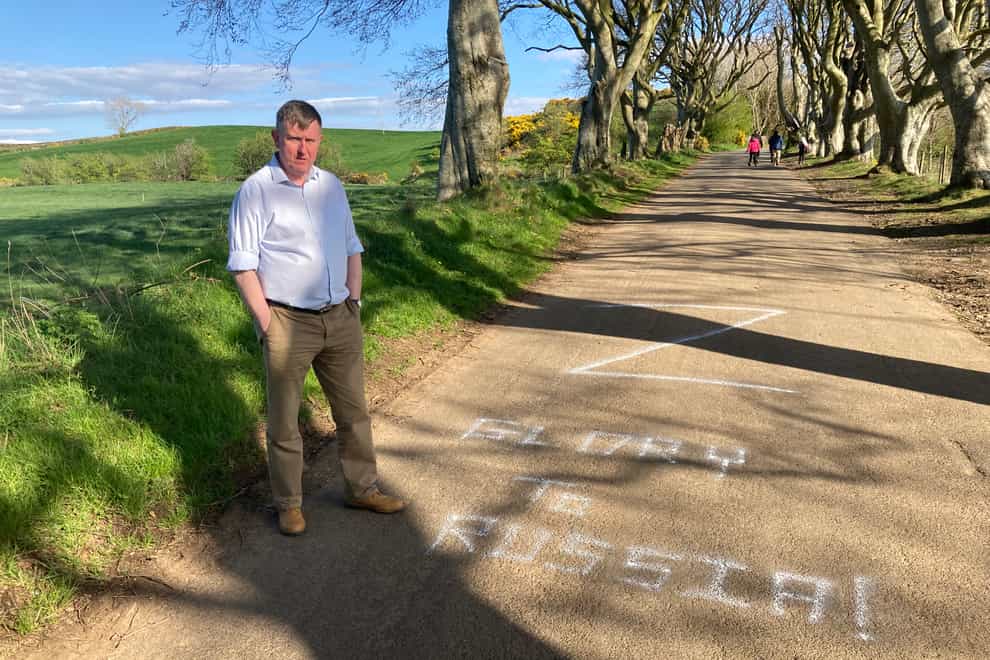 DUP North Antrim Assembly candidate Mervyn Storey has condemned pro-Russian graffiti which has appeared at the Dark Hedges in Co Antrim. The route was made famous world wide after being featured in Game Of Thrones (DUP/PA)