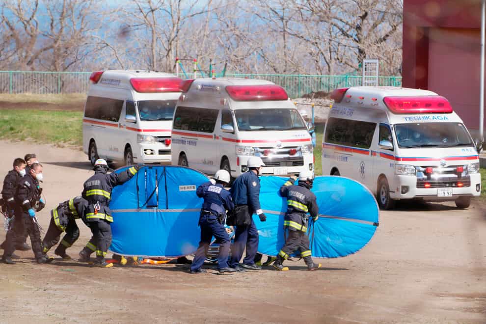 Rescue helicopters have found seven of the 26 people from a missing tour boat in the frigid waters of northern Japan (Koki Sengoku/Kyodo News/AP)