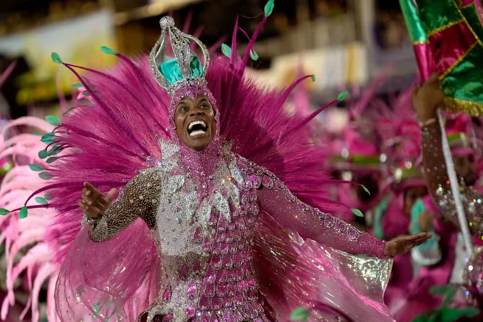 A performer from the Mangueira samba school parades during Carnival celebrations at the Sambadrome (AP)