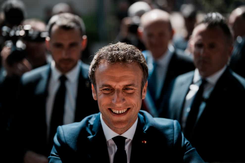 Exit polls suggest Emmanuel Macron will win the presidential run-off (AP Photo/Thibault Camus)