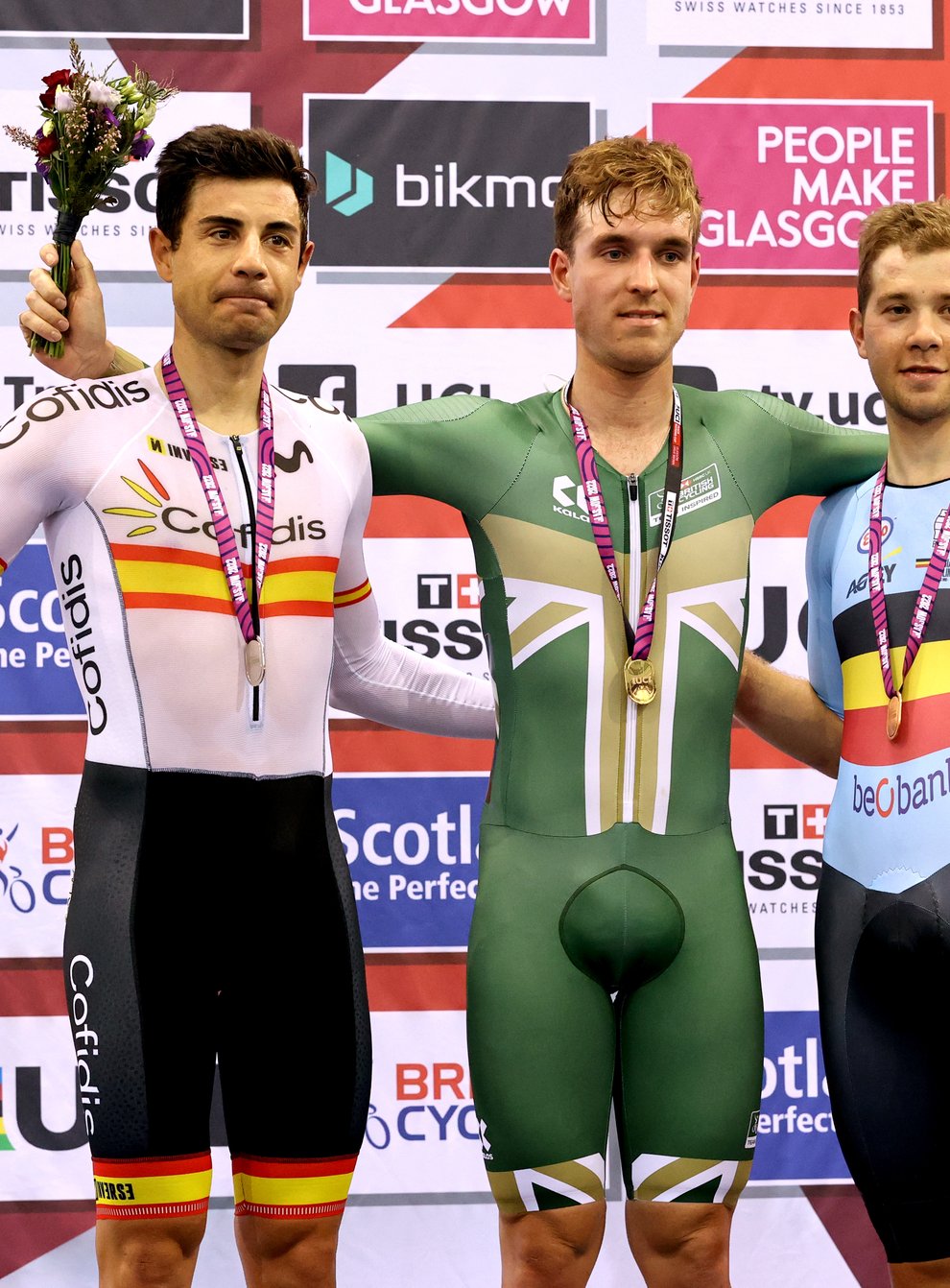 Ollie Wood (centre) celebrates after winning gold in the Men’s Omnium at the Tissot UCI Track Nations Cup in Glasgow (Steve Welsh/PA)