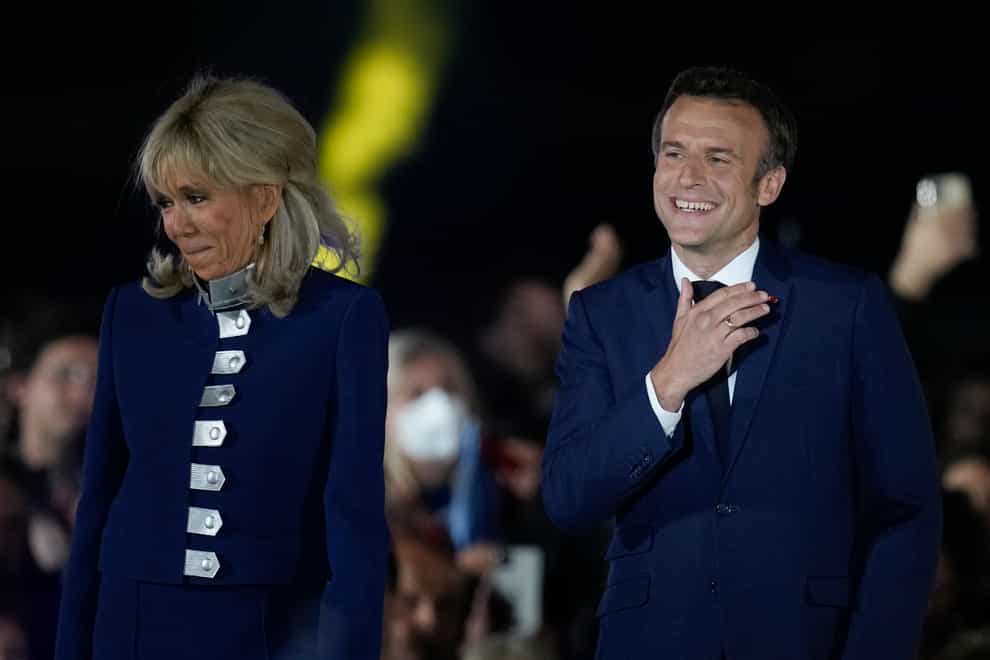 French President Emmanuel Macron and French first lady Brigitte Macron (Christophe Ena/AP)