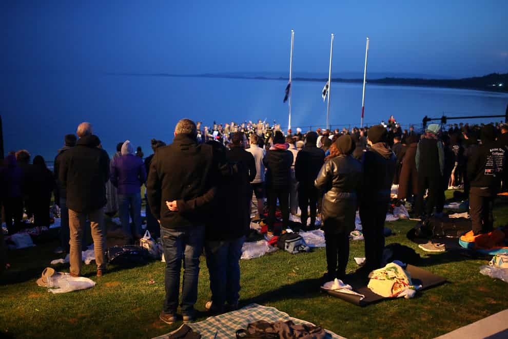 Visitors attend the dawn service at Anzac Cove beach, site of the First World War landing of Australian and New Zealand Army Corps troops on April 25 1915 (Emrah Gurel/AP)