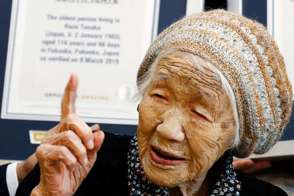 Kane Tanaka, then 116, reacts after receiving a Guinness World Records certificate (Takuto Kaneko/Kyodo News/AP)