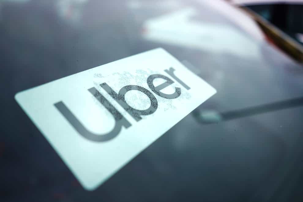 Uber has agreed to pay a fine for misleading riders by falsely warning they could be charged a cancellation fee and for inflating estimates of what a taxi would cost for the same journey, Australia’s consumer watchdog said (Nam Y. Huh/AP)