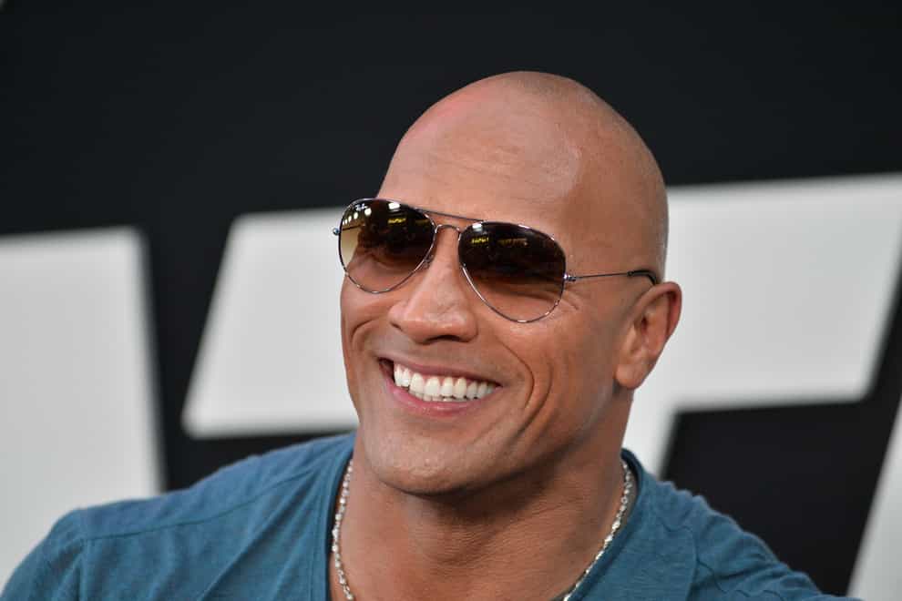 The Rock is known for his immense physique (Alamy/PA)
