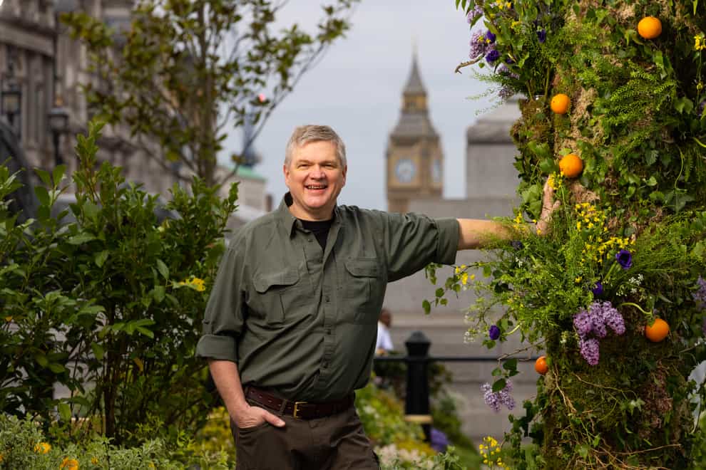 Ray Mears stands in a ‘wild’ Trafalgar Square, as it is covered in plants and flowers to launch innocent Drinks’ ‘The Big Rewild’ campaign, an initiative to rewild and protect 2 million hectares of land (David Parry/PA Wire)
