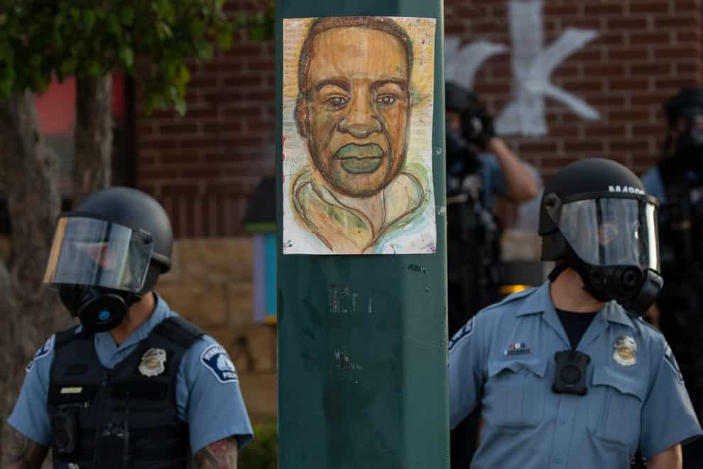 Minneapolis police stand outside the department’s 3rd Precinct on May 27 2020 in Minneapolis (Carlos Gonzalez/Star Tribune via AP)