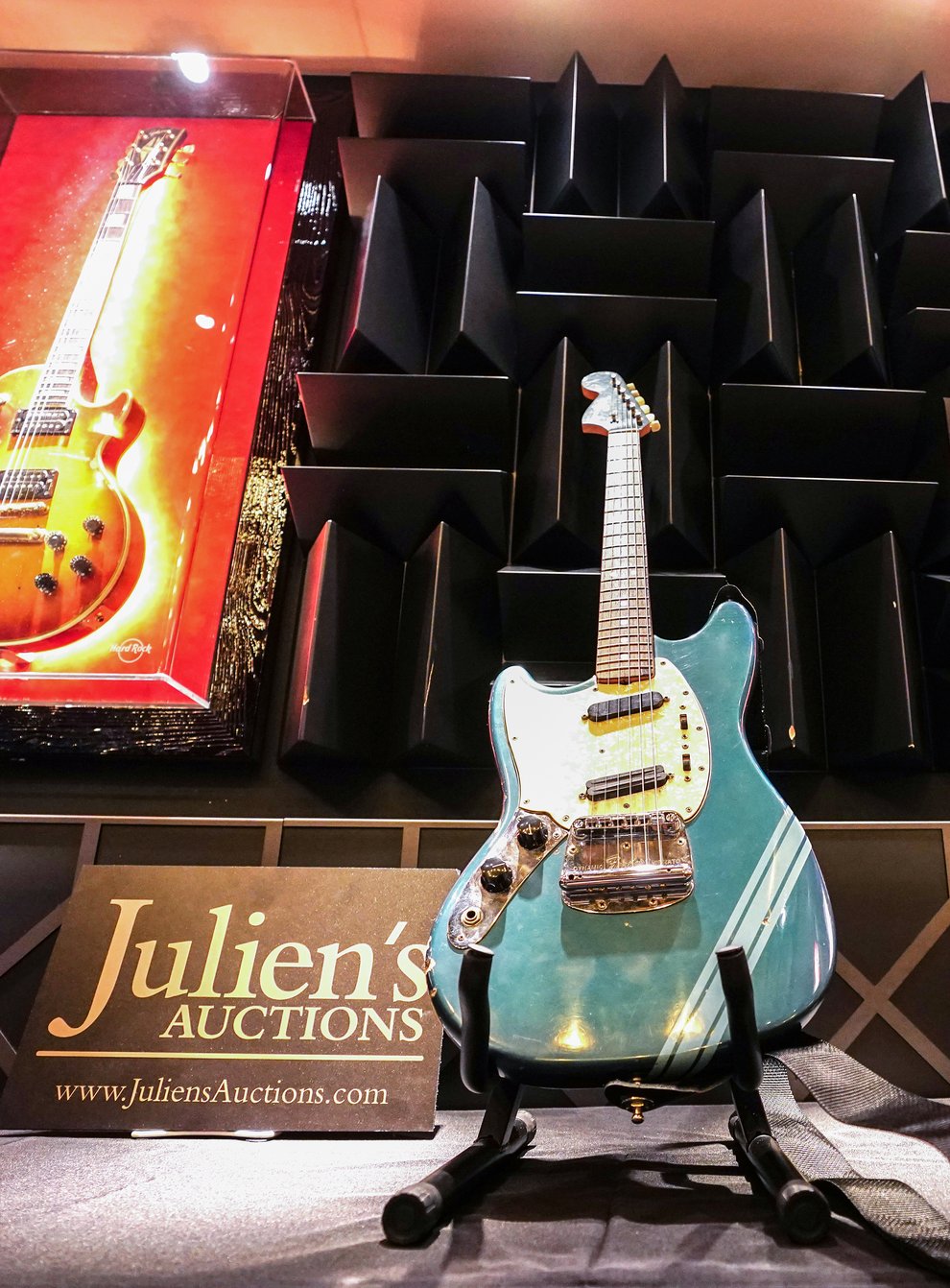 Kurt Cobain’s 1969 Fender Mustang Competition Lake Placid Blue Finish electric guitar, which he used in the video for Nirvana’s Smells Like Teen Spirit, on display at the Hard Rock Cafe, London, before it goes up for auction, with an estimate of 600,000 – 800, 000 US dollars in the Julien’s Auctions Music Icons three-day auction event in New York, beginning on May 20. Picture date: Wednesday April 27, 2022.