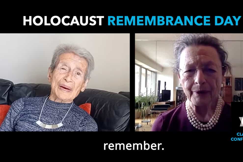 Two of 100 Holocaust survivors, Eva Evans, left, and Judith Bihaly, who participated in a video marking Yom HaShoah, Israel’s Holocaust Remembrance Day (Greg Schneider/AP)