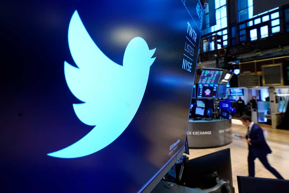 The logo for Twitter appears above a trading post on the floor of the New York Stock Exchange (Richard Drew/AP)
