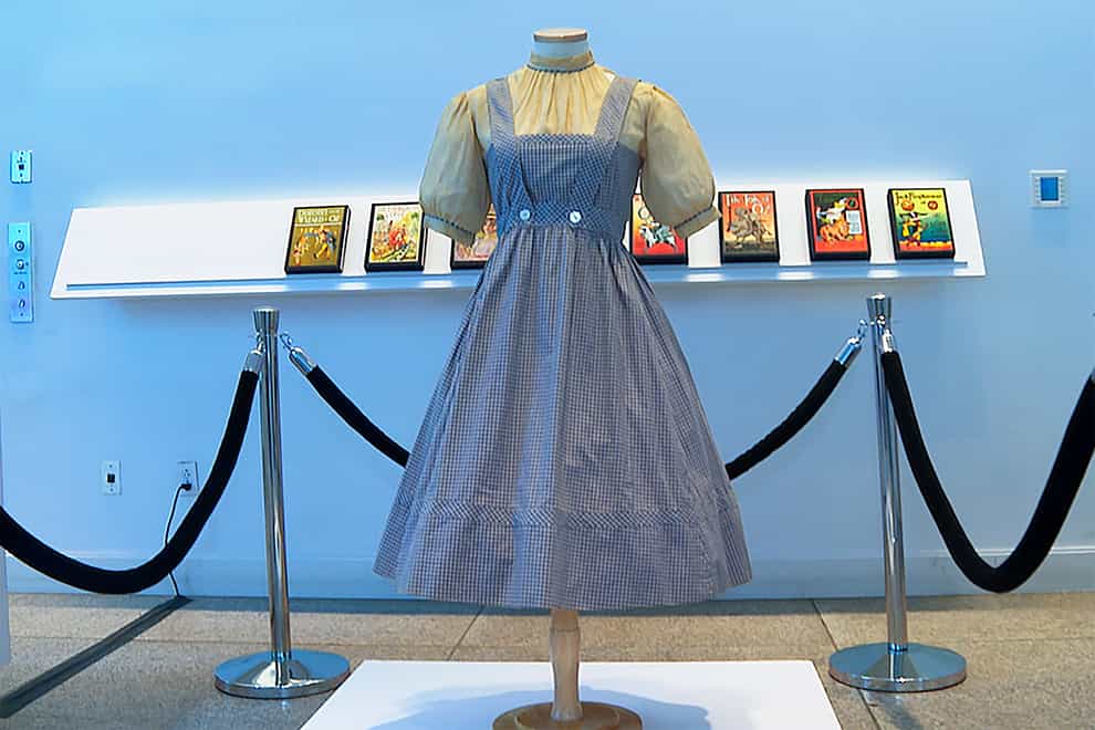A blue and white checked gingham dress, worn by Judy Garland in The Wizard Of Oz (Katie Vasquez/AP)