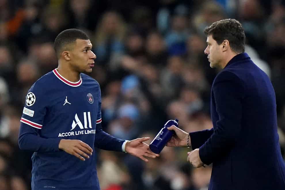 Mauricio Pochettino has said that both he and Kylian Mbappe will “100 per cent” be at PSG next season (Tim Goode/PA)
