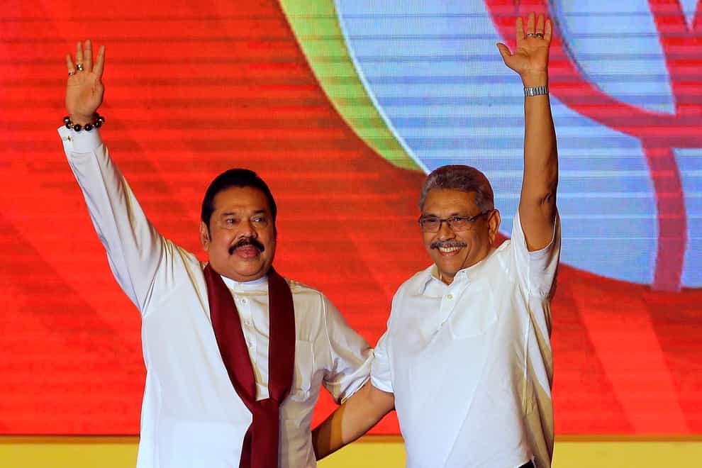 Mahinda Rajapaksa, left, and his brother Gotabaya Rajapaksa (Eranga Jayawardena/AP)