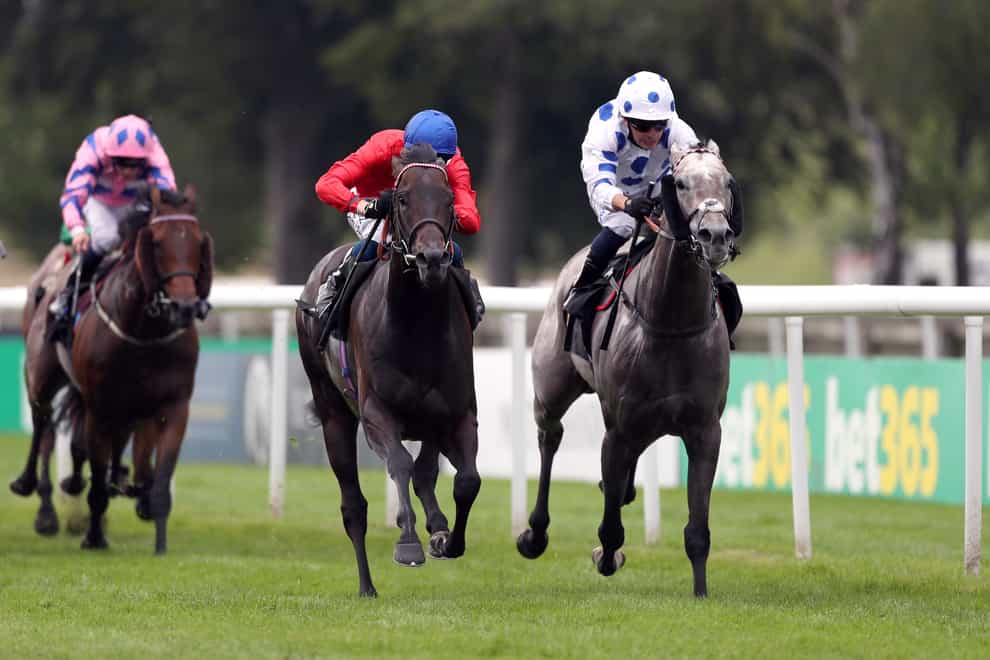 Twilight Calls (centre) on his way to winning on the July Course at Newmarket in 2021 (David Davies/PA)