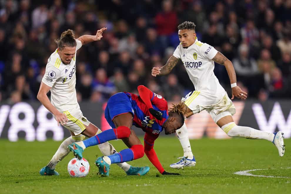 Wilfried Zaha (centre) has been defended by Crystal Palace manager Patrick Vieira after Leeds midfielder Kalvin Phillips said the winger ‘dives a lot’ (John Walton/PA)