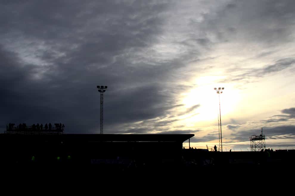A general view of the sun beginning to set behind the Gayfield Park stadium (PA)