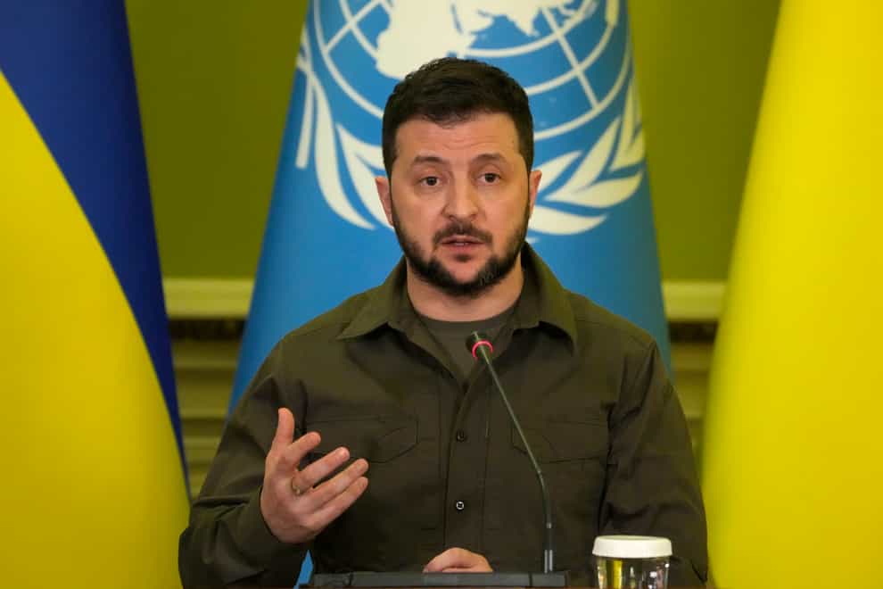 Ukrainian President Volodymyr Zelensky switched into Russian in his nightly video address to urge Russian soldiers not to fight in Ukraine, saying even their generals expected that thousands of them would die (Efrem Lukatsky/AP)