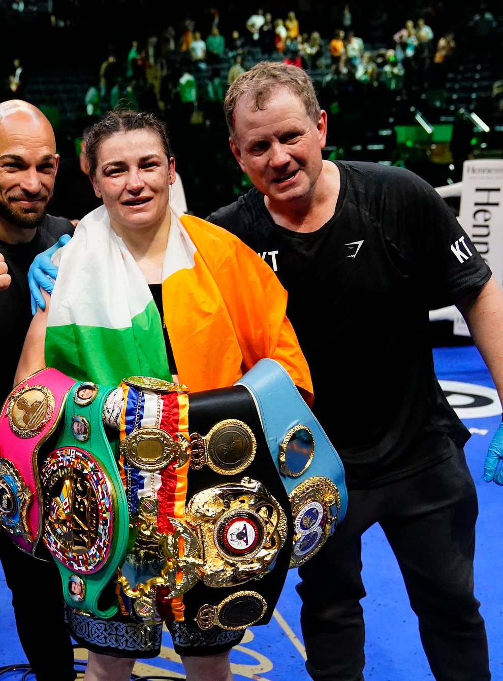 Katie Taylor, centre, is still the undisputed lightweight champion (Frank Franklin II/AP/PA)