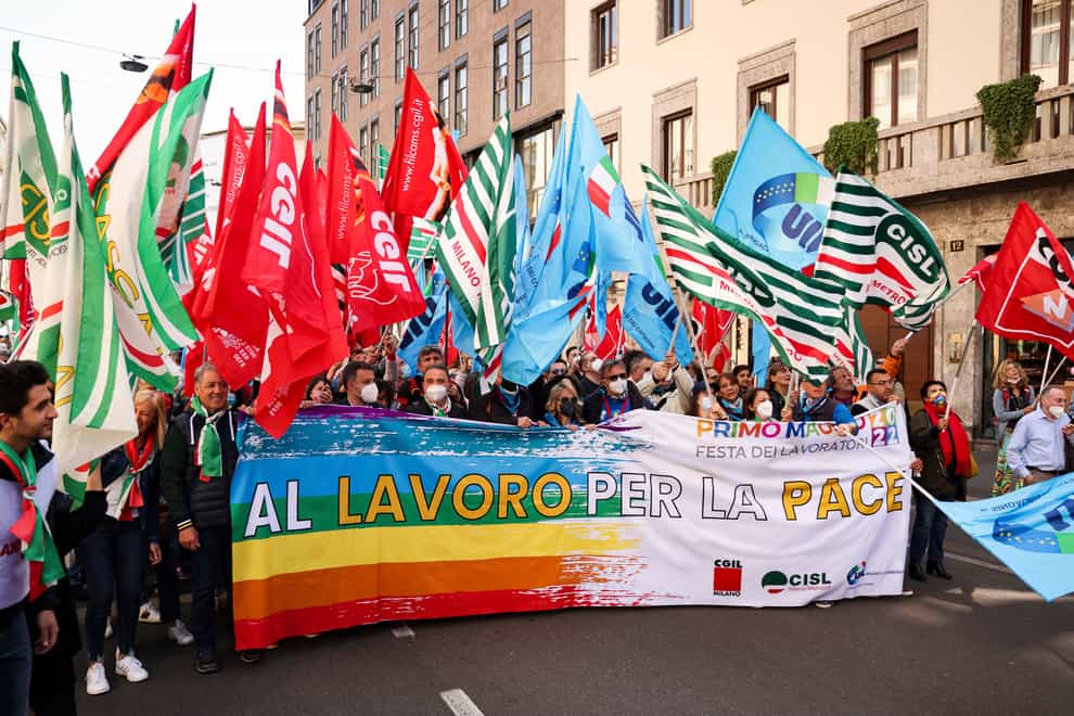 Demonstrators participate in a May Day march organised by trade unions in Milan, Italy (LaPresse/AP)
