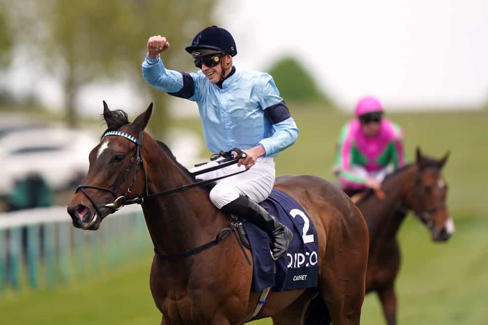 Jockey James Doyle celebrates after winning the Qipco 1000 Guineas Stakes with Cachet on day three of the QIPCO Guineas Festival at Newmarket Racecourse, Newmarket. Picture date: Sunday May 1, 2022.
