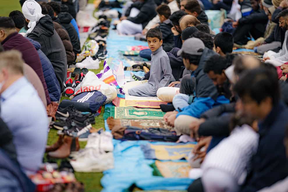 People gather to pray together at Bristol’s Big Eid Salah: Eid al- Fitr 2022 (Ben Birchall/PA)