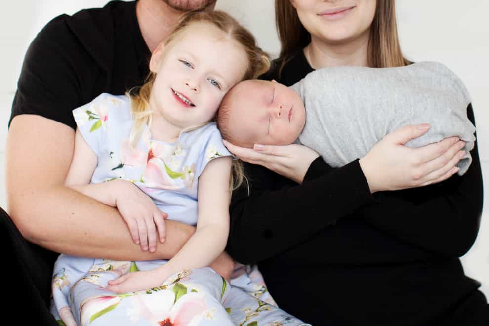 Sammy Gray and her family. Ms Gray underwent an innovative cancer treatment before being able to conceive her son Walter (Kelly Couttie Photography/PA)