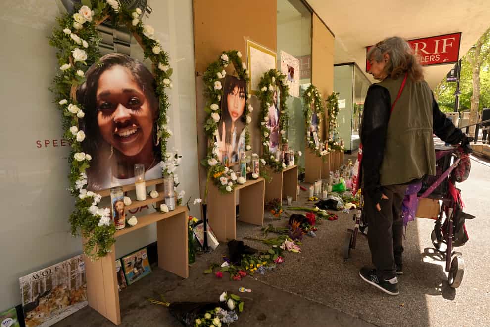 Three alleged gang members have been charged with murder in the slayings of three women fatally shot in a gun battle that rocked California’s capital city a month ago (Rich Pedroncelli/AP, File)