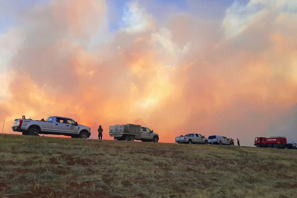 Plumes of smoke from wildfires near Las Vegas, New Mexico (Jasper Bives via AP)