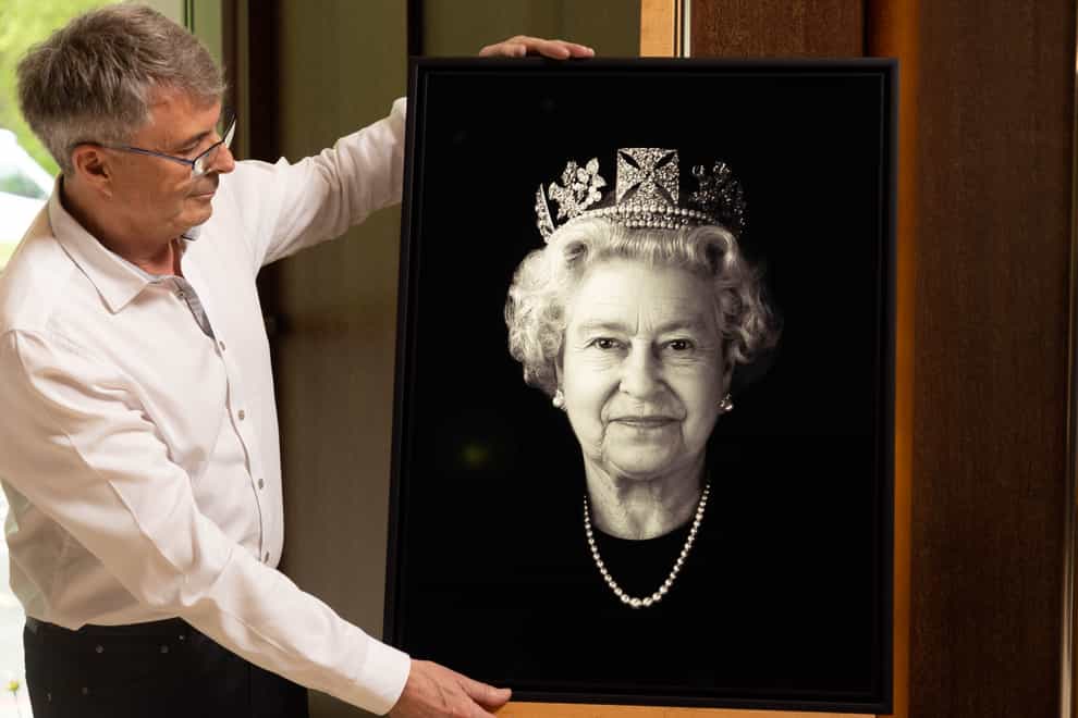 A photographic portrait of The Queen, titled Platinum Queen: Felicity, by Rob Munday (David Parry/PA)