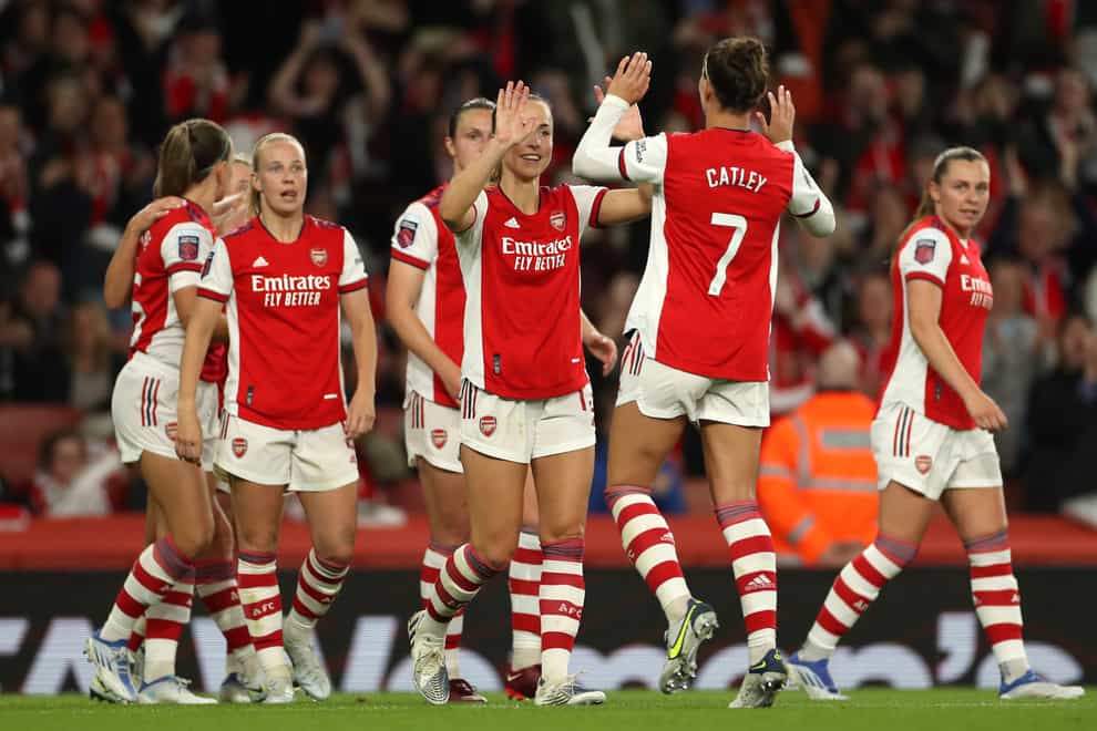Caitlin Foord, centre, hit a late double as Arsenal beat Tottenham in the Women’s Super League (Bradley Collyer/PA)