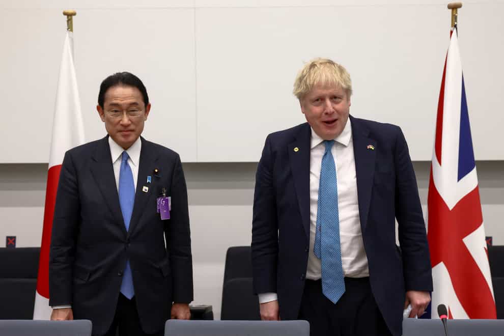 Japanese Prime Minister Fumio Kishida and Prime Minister Boris Johnson at a bilateral meeting during a Nato summit in Brussels in March (/PA)