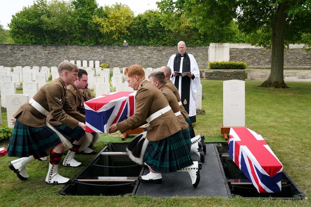 A bearer party from the Royal Regiment of Scotland carry the coffin of Private William Johnston as he is buried with full military honours at Loos British Cemetery, Loos-en-Gohelle, France (Gareth Fuller/PA)