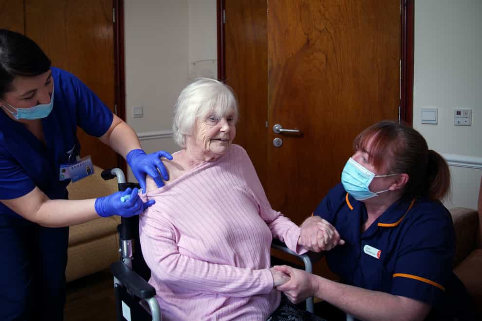 Bettie McCluckie receives a spring booster of Covid-19 vaccine at Overdene House care home in Winsford, Cheshire (Peter Byrne/PA)