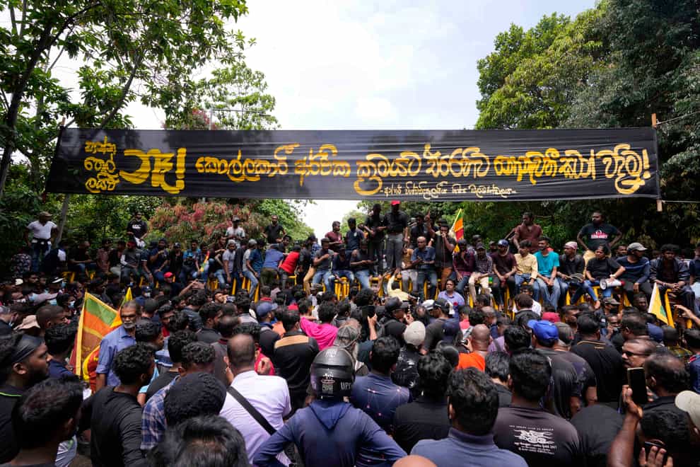 Sri Lankan protesters demand the resignation of the government in Colombo (Eranga Jayawardena/AP)