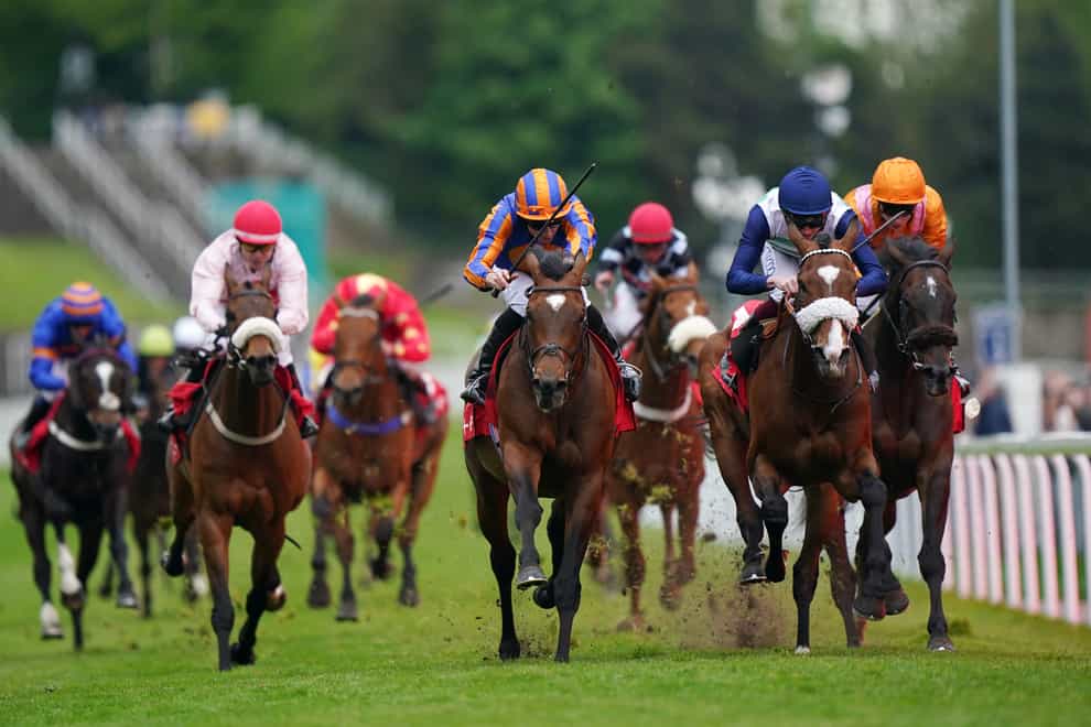 Cleveland (centre) benefited from an exceptional Ryan Moore ride (Tim Goode/PA)