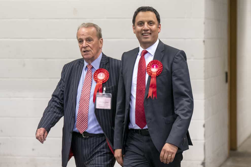 Scottish Labour leader Anas Sarwar with Malcolm Cunning (left) at the Glasgow City Council count at the Emirates Arena in Glasgow (Jane Barlow/PA)