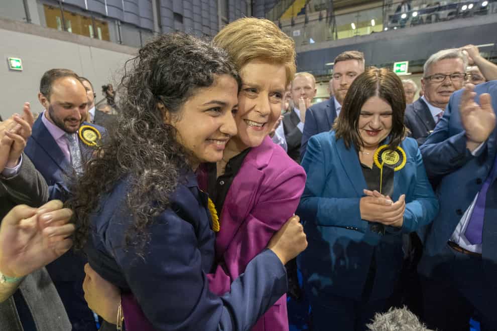First Minister Nicola Sturgeon with SNP’s Roza Salih (left) at the Glasgow City Council count (Jane Barlow/PA)