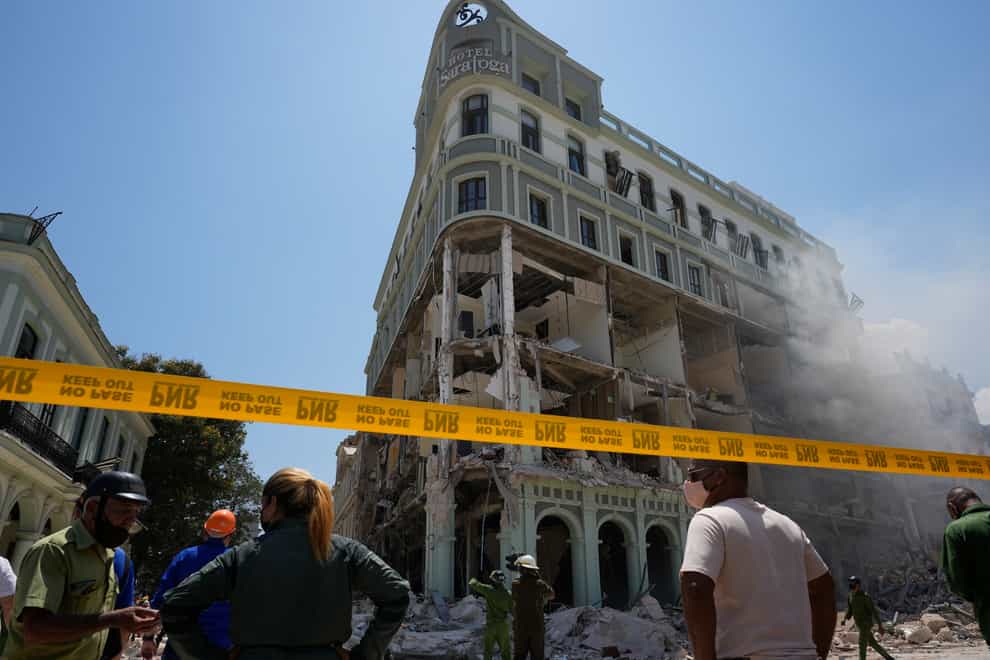 The five-star Hotel Saratoga is heavily damaged after an explosion (Ramon Espinosa/AP)