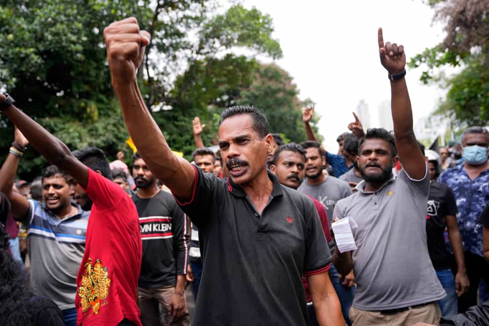 Sri Lankans demanding the resignation of the government (Eranga Jayawardena/AP)