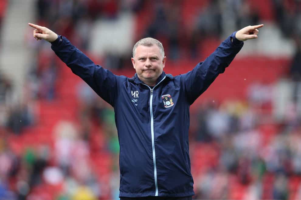 Mark Robins salutes the Coventry fans at full-time (Barrington Coombs/PA)