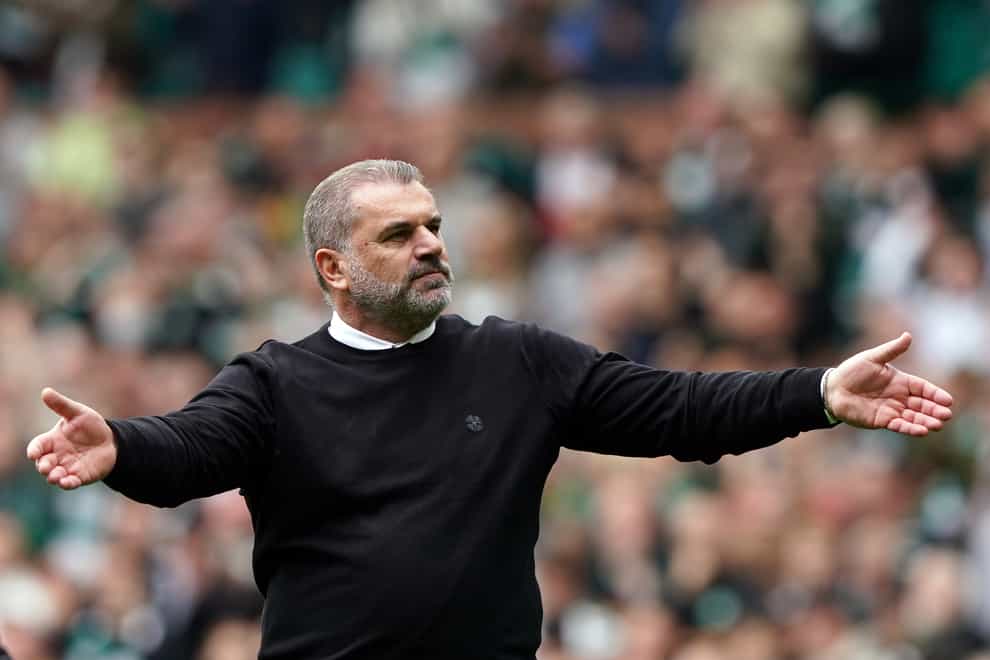 Celtic manager Ange Postecoglou celebrates with the fans (Andrew Milligan/PA)