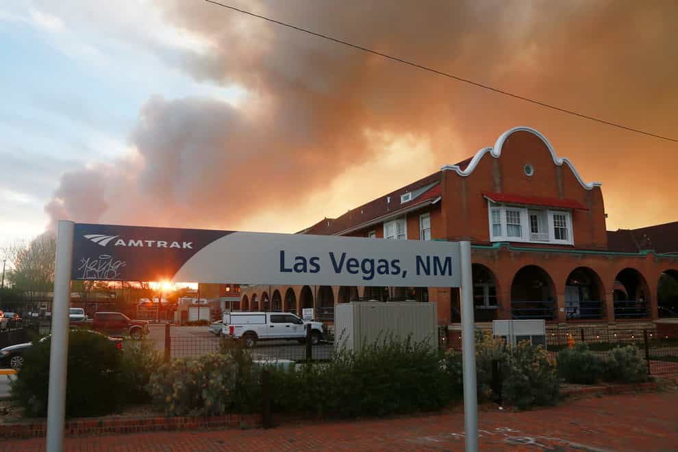 A sunset seen through a wall of wildfire smoke from the Amtrak train station in Las Vegas, New Mexico, on Saturday May 7 2022 (Cedar Attanasio/AP)