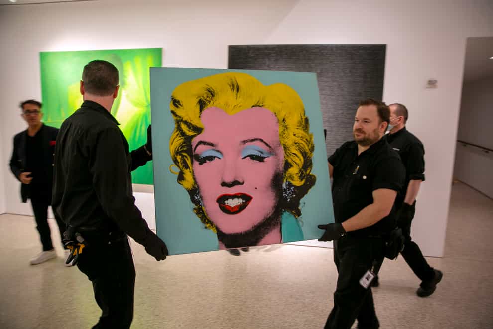 Andy Warhol’s Shot Sage Blue Marilyn sells for £158 million at auction (Ted Shaffrey/AP)