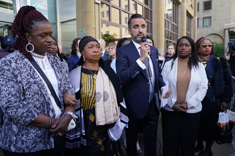 Sheku’s mother Aminata Bayoh (second left) with Sheku’s sisters and lawyer Aamer Anwar (centre) outside Capital House in Edinburgh ahead of the start of a public inquiry into the death of Sheku Bayoh (Andrew Milligan/PA)