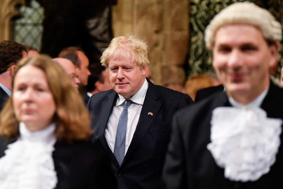 Prime Minister Boris Johnson walks through the Members’ Lobby ahead of the State Opening of Parliament (Toby Melville/PA)