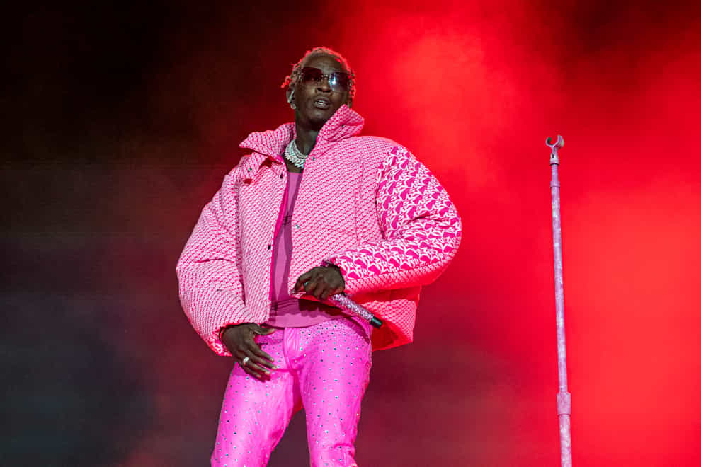 FILE – Young Thug performs on day four of the Lollapalooza Music Festival on Sunday, Aug. 1, 2021, at Grant Park in Chicago. The Atlanta rapper, whose name is Jeffrey Lamar Williams, was arrested Monday, May 9, 2022, in Georgia on conspiracy to violate the state’s RICO act and street gang charges, according to jail records. (Photo by Amy Harris/Invision/AP, File)