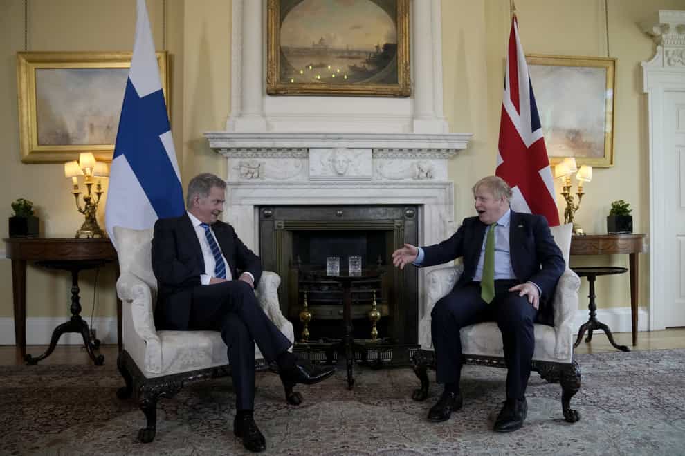 Prime Minister Boris Johnson (right) with the president of Finland, Sauli Niinisto in March (Matt Dunham/PA)